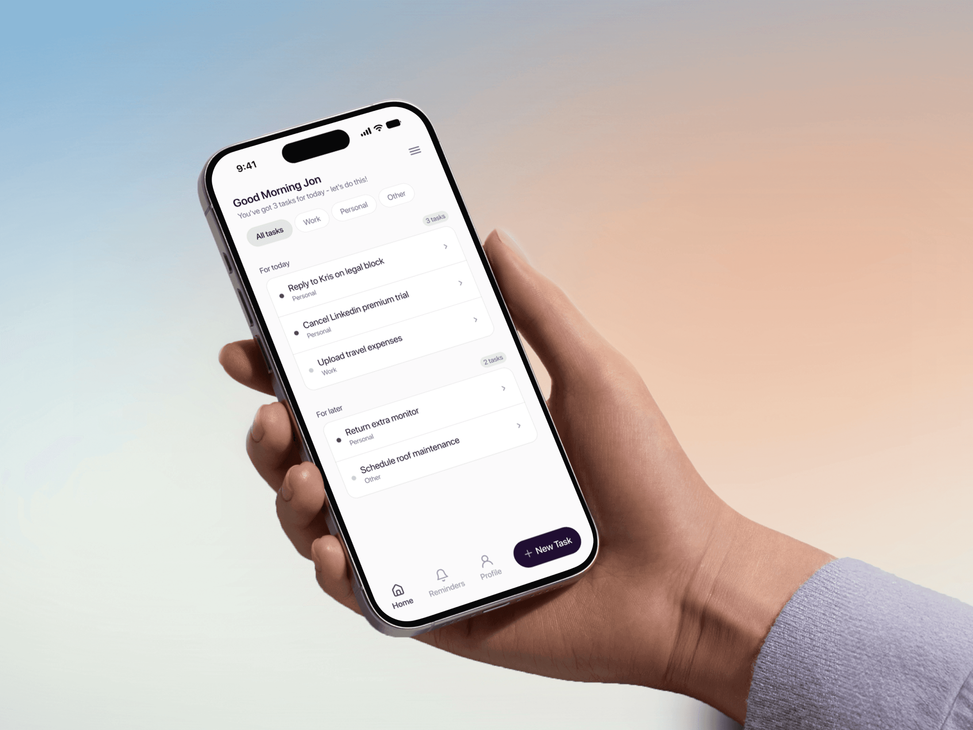 A hand holding a phone with a minimal productivity list interface